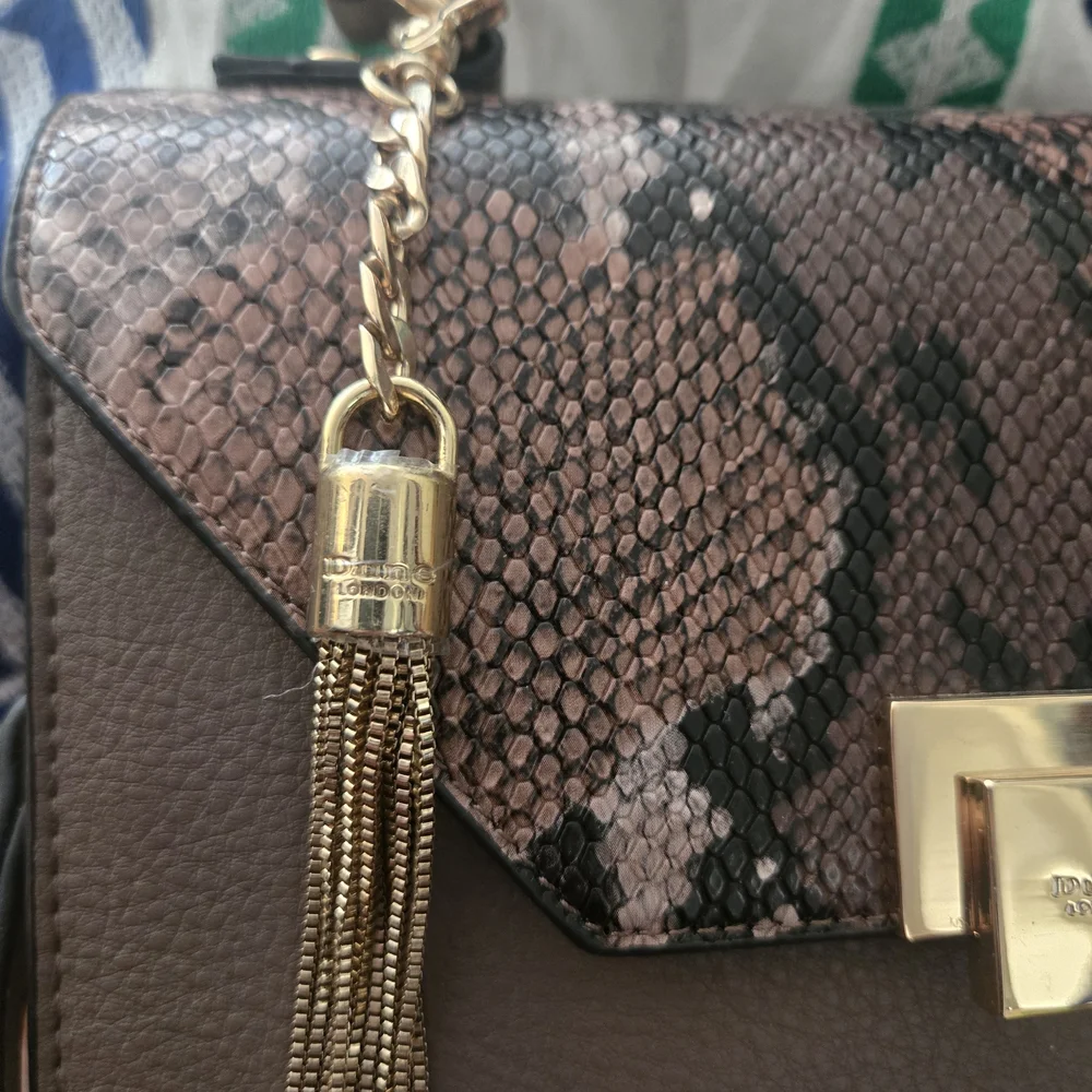 Dune London Taupe Satchel Crossbody with Snake-Print Flap and Gold Tassel